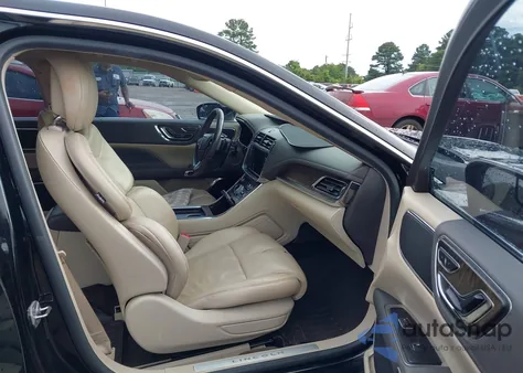 2017 Lincoln Continental Select z USA, uszkodzony, nr VIN 1LN6L9SK8H5600795